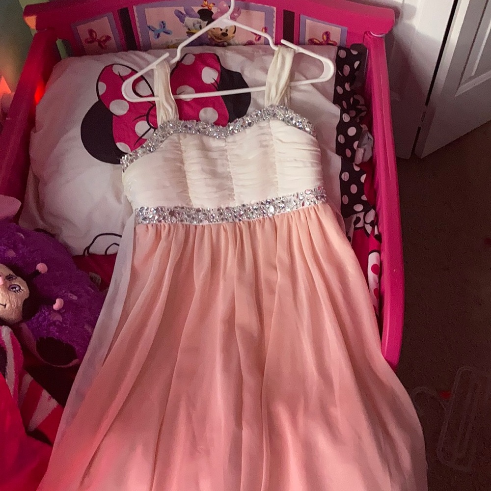 Long, flowy. Light pink dress with rinestones